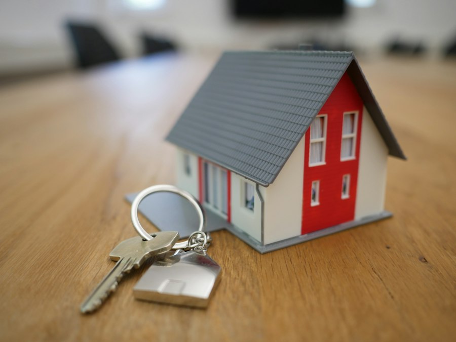 Couple reviewing home sale on phone