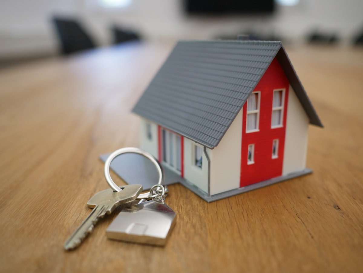 House keys beside a model home before accepting a cash offer